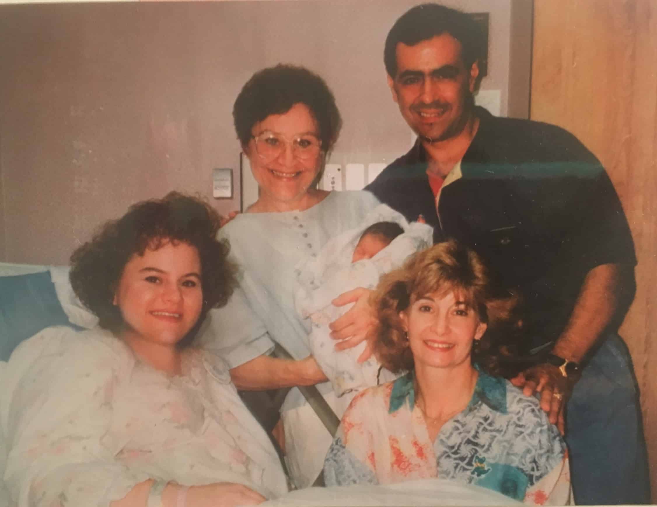 Torie and her family in the hospital after she was born